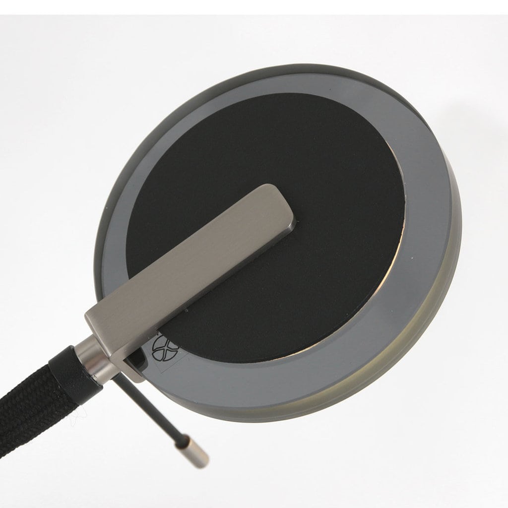 Minimalistische LED vloerlamp met draaibare kop en moderne uitstraling, ideaal voor sfeervolle interieurverlichting en design verlichting.